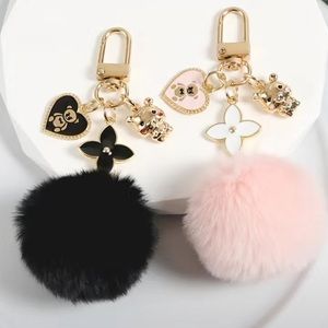 NWT Love heart bear pom pom keychain